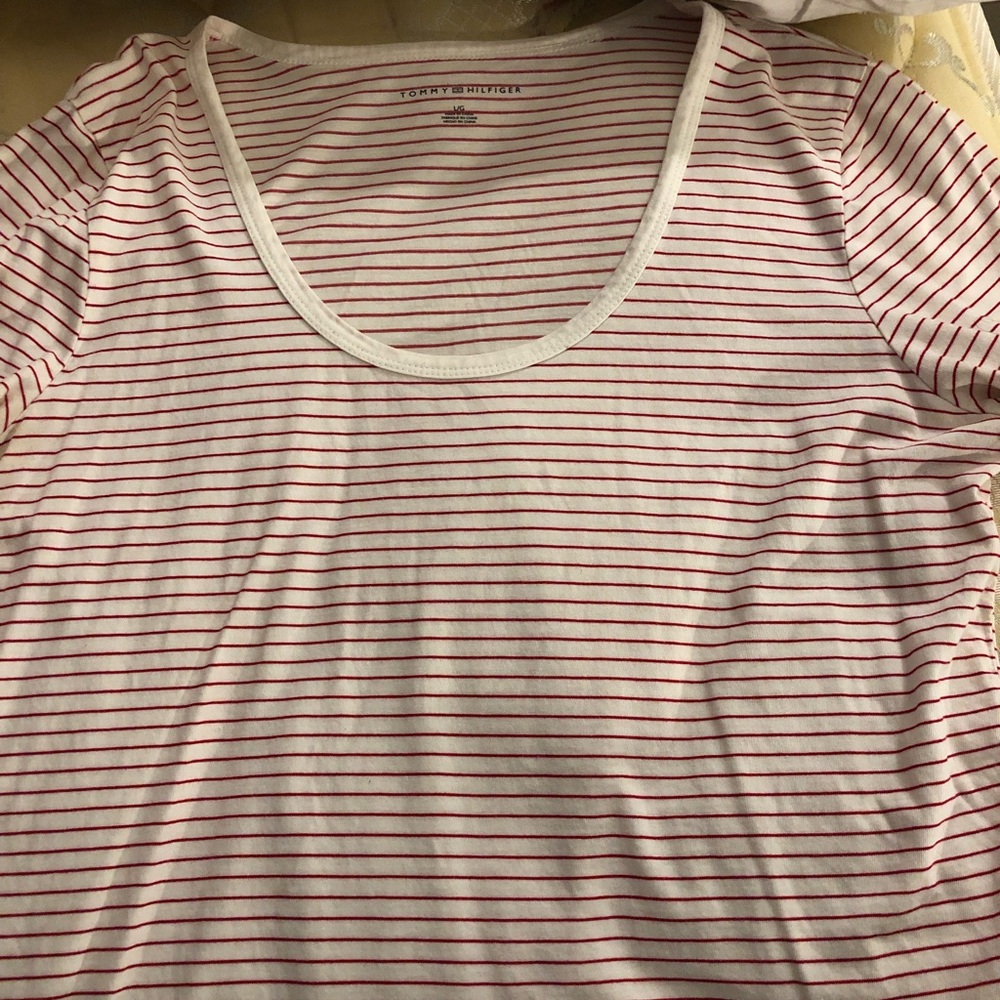 Size large shirt. White with red stripes.